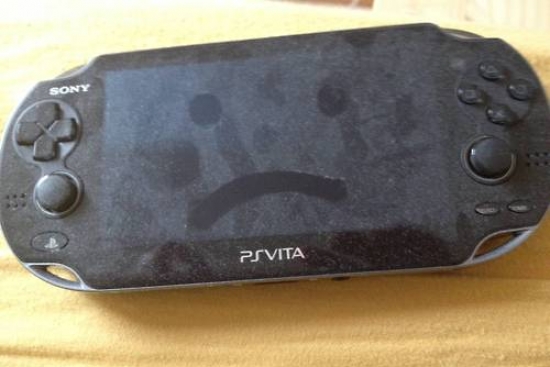 dusty-PS-vita-playstation-vita-sad-face-sad-14225323634.jpg