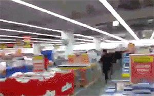 buying-ps4-destroying-store-black-friday-1386095291F.gif