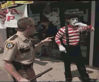 cop-police-hits-mime-stick-13625062484.gif