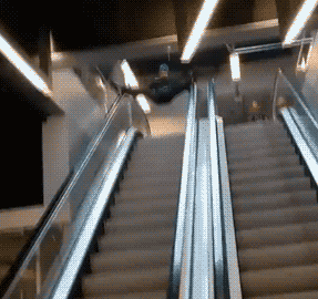 guy-sliding-down-escalator-fail-smash-13