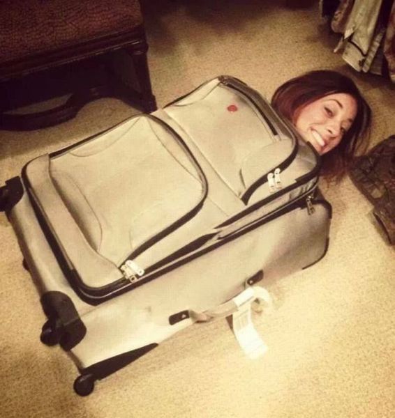 girl in luggage