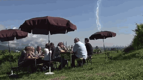 IRTI - funny GIF #6856 - tags: lightning hits pub umbrella beer garden